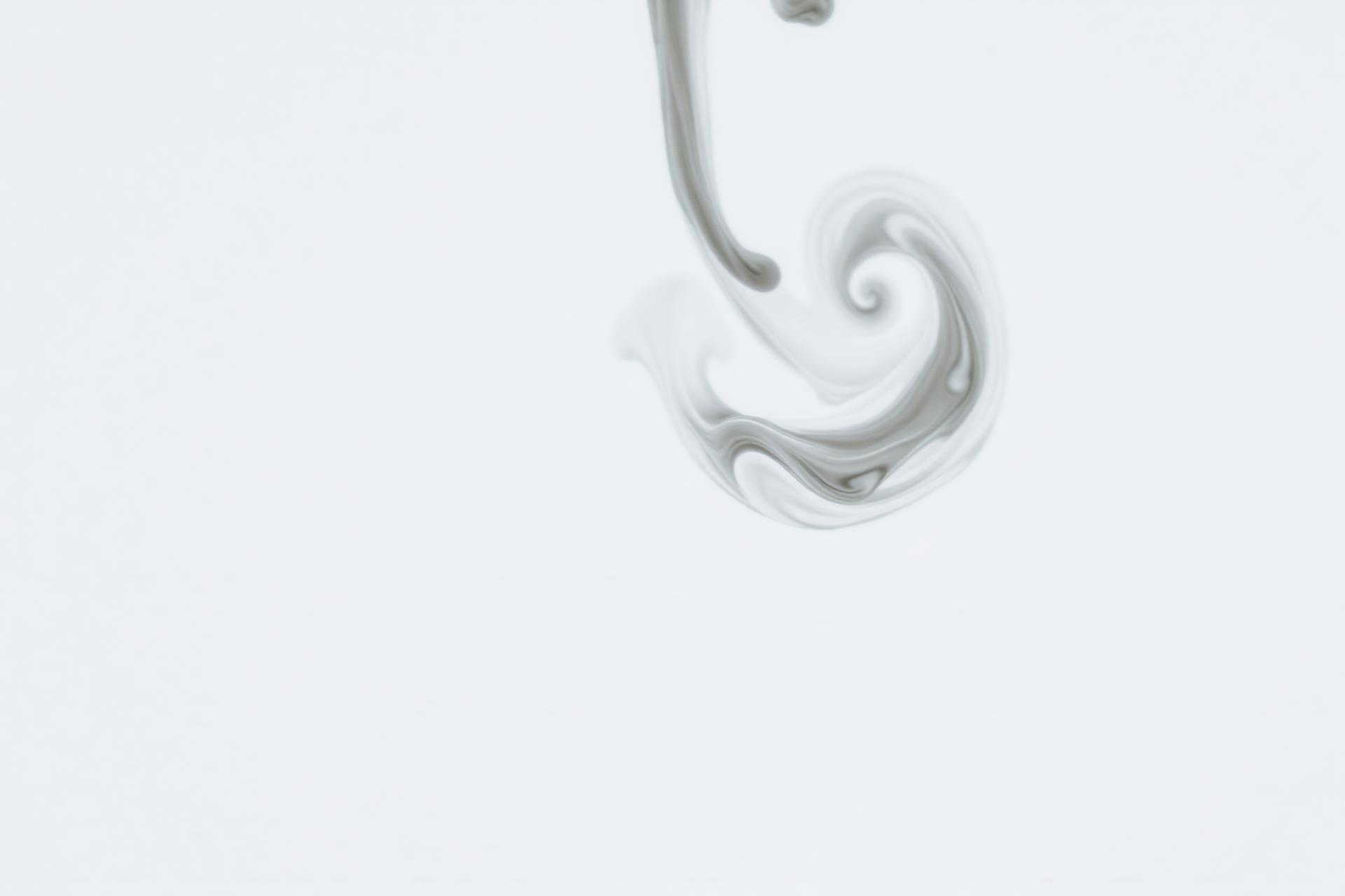 Ink dispersing slowly through water